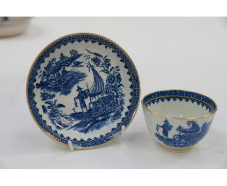 A Royal Worcester tea bowl and saucer, crescent backstamp, Fisherman and Cormorant pattern 