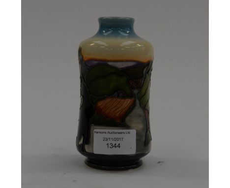 A Moorcroft first quality limited edition 101/150 vase in 'A Potters Home' pattern, designed by and signed to base by Kerry G