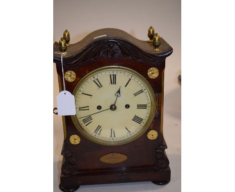 A mid 19th Century bracket clock, rosewood cased, with Roman numerals