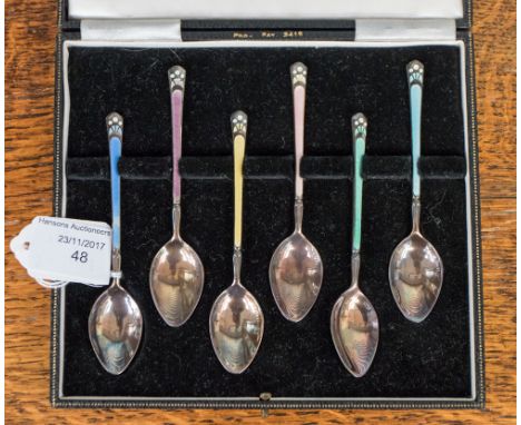 A cased set of six silver enamelled coffee spoons, Birmmingham 1960, Turner & Simpson Ltd, (enamel damaged to one spoon)