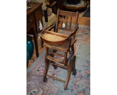An early 20th Century child's commode chair