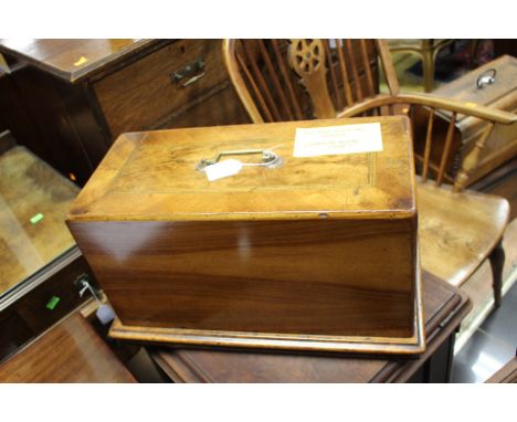 A late 19th Century mahogany cased superb manual sewing machine, cast iron black painted frame, the plaque reading manufactur