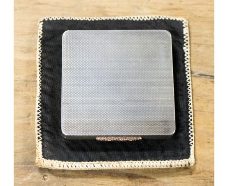 A George VI silver machine engraved powder compact, Birmingham 1942, slip case 
