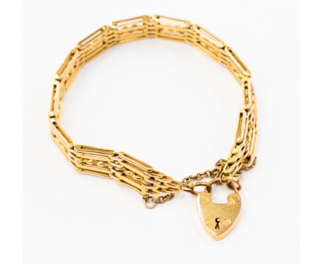 A 9ct gold gate link bracelet with padlock clasp, approx weight  20.0 grams 