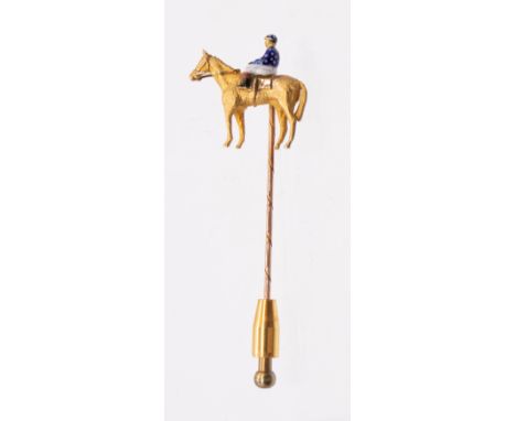 Equestrian interest: a novelty enamel and 9ct gold stick pin, modelled in the form of a horse and jockey, horse approx 25mm, 