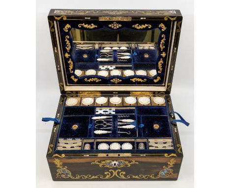 A mid Victorian inlaid coromandel rectangular sewing box, the cover and body with cut brass, mother-of-pearl and abalone deco