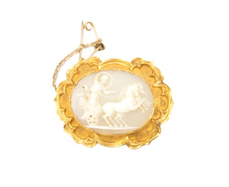 A fine 19th century carved shell cameo, comprising an oval cameo depicting horse and chariot, within a scrolled decorative go