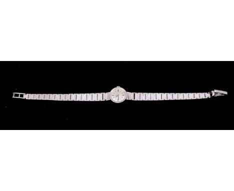 Omega: a Ladies vintage 9ct white gold wristwatch, comprising a round silvered signed dial with applied baton hour indices, b