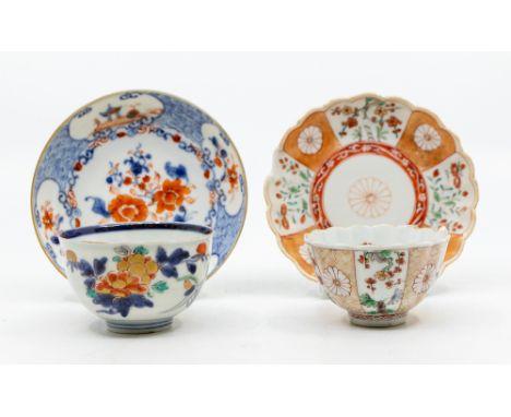 A Chinese Kakiemon tea bowl and saucer, Kangxi Period, circa 1700 together with a Chinese Export Imari tea bowl and a similar