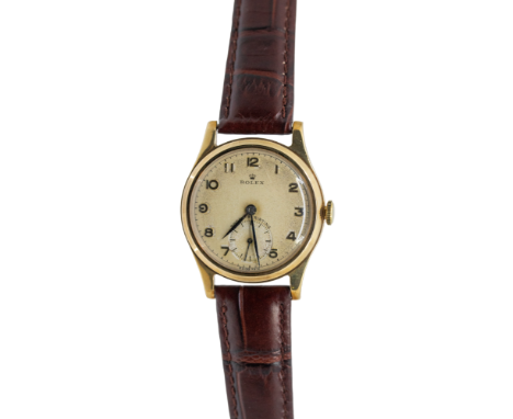 Rolex: a Gentleman's vintage 9ct gold Rolex manual wind wristwatch, circa 1947, comprising a cream dial with applied gilt Ara