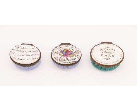 A collection of three 18th Century oval enamel patch boxes, fluted bodies with blue or green ground, all with interior mirror