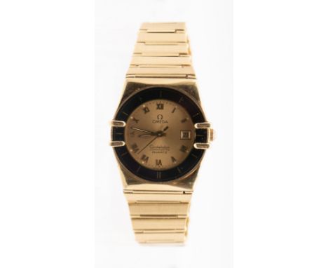 Omega: a Ladies 18ct gold Constellation quartz chronometer wristwatch, comprising a round signed gold tone dial, with applied