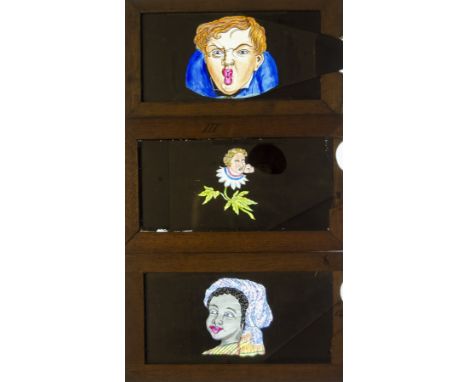 Ten Mahogany-Framed Hand-Coloured Magic Lantern Slipping Slides with Moving Eyes,  of man coming out of a flower, a cat with 