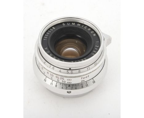 A Leitz ELC 35mm f/2 Summicron Lens, serial no. 1656558, 1959, chrome, barrel, G-VG, light marks to chrome, elements, VG, wit