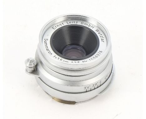 A Leitz 3.5cm f/3.5 Summaron Lens, serial no. 1556976, 1958,E39 mount, barrel, G, elements, G-VG, light haze, with maker's ca