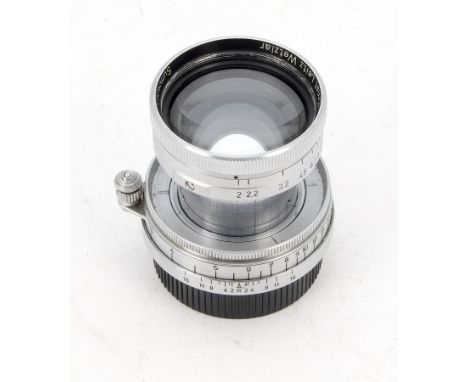 A Leitz 5cm f/2 Summitar Lens, serial no 487950, 1938, from the first production batch, chrome, continental scale, circular i