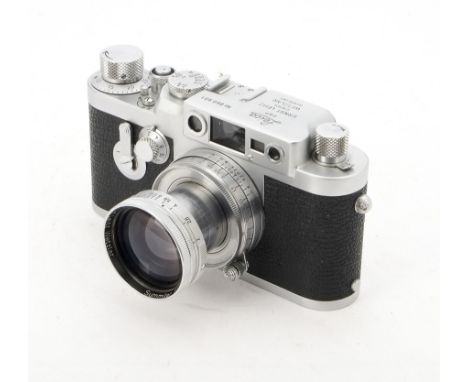 A Leica IIIg Camera, serial no. 860901, 1957, chrome, shutter working, body, VG, with a 5cm f/2 Summitar lens, no. 755206, 19