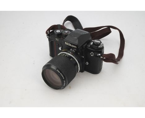 A Nikon F3 SLR Camera, serial no. 1229069, black, shutter working, body, F-G, some surface dirt and marks, with a 43-86mm f/3