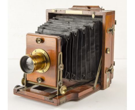 A J. Lancaster Instantograph Camera, double extension, black leather tapered bellows, tilt and swing back, body, G, with a la