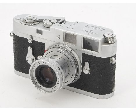 A Leica M2 Rangefinder Camera, serial no. 1018320, 1961, chrome, shutter working, innacurate at slow speeds, body, F-G, light