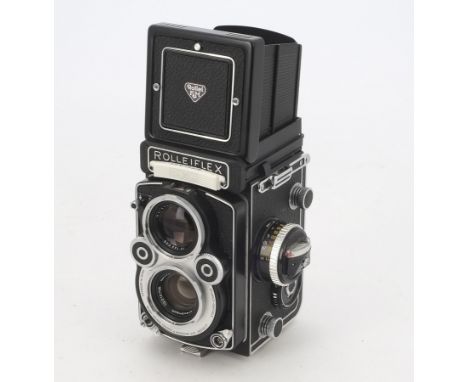 A Rolleiflex 3.5F 'White Face' TLR Camera, serial no. 2853377, type 4, shutter working, meter responding, body, VG-E, with Sc