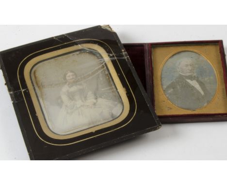 Portrait Daguerreotypes,  cased tinted quarter-plate of Thomas Morgan, F-G, spotting  and French half-plate of seated lady, l