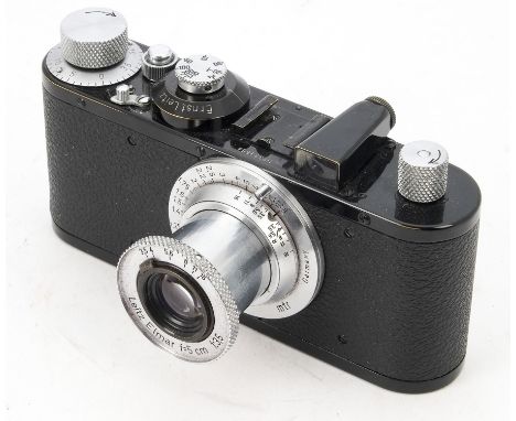 A Leica Standard Model E. Camera, serial no. 333584, 1939, black, chrome fittings, shutter working, body, VG, base plate repa