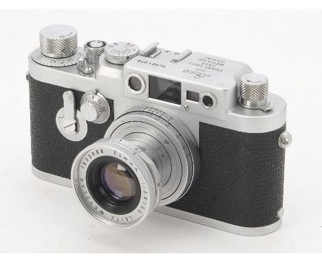 A Leica IIIg Camera, serial no. 981073, 1959, chrome, shutter working, blind requires attention, body VG-E, with 50mm f/2.8 E
