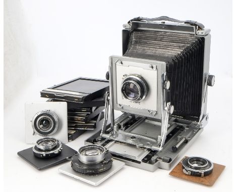 A Toyo Field Camera, serial no. SF-12372, grey enamel finish, 5X4" exposures, body, G, with Schneider-Kreuznach lenses; a 135