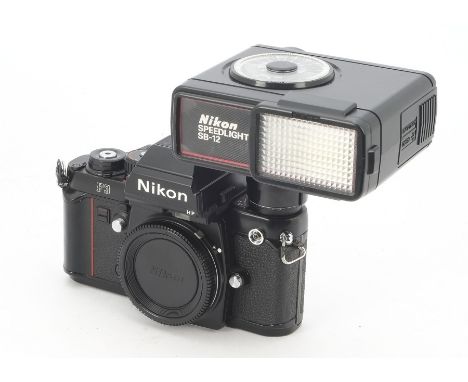 A Nikon F3 HP SLR Body, serial no. 1206439, black, shutter working, body, F-G, some light brassing to top plate and paint mar