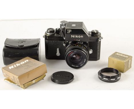 A Nikon F Photomic FTN SLR Camera, serial no. 7086974, black, shutter working, body, G, brassed, with a 29mm f/2.8 Mitsuki MC