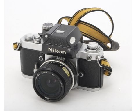 A Nikon F2 Photomic SLR Camera, serial no. 7460376, chrome, shutter working, body, G-VG, light marks to paint on photomic hea