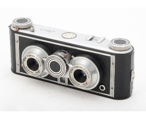 A Iloca Stereo II Camera, serial no. 310858, chrome, shutter working, body, F-G,tape covering to film door, with 35mm f/3.5 J