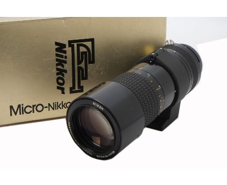 A Nikon Micro-Nikkor 200mm f/4 Lens, serial no. 178394, AI, black, barrel, VG, elements, VG, light water like marks to front 