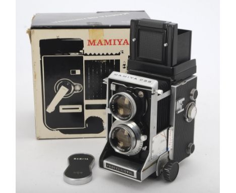 A Mamiya C33 Professional TLR Camera, serial no. H 334248R, body VG-E, with Mamiya Sekor 80mm f/2.8 lens, no. 64854, elements