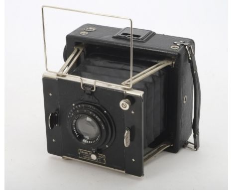 A Ihagee Sport 1820 Strut Folding Camera, serial no. 378502, 9x12cm plates, shutter working, Sands, Hunter & Co. dealer plate
