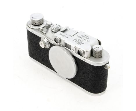 A Leica IIIa Camera, serial no. 357122, 1948/50, chrome, shutter working, refinished in sharkskin vulcanite, body, G-VG, with