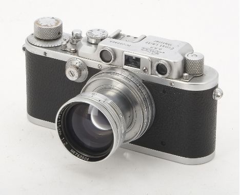A Leica IIIf Camera, serial no. 280865, 1938, chrome, shutter working, body, F-G, chrome degredation to rewind knob, light me