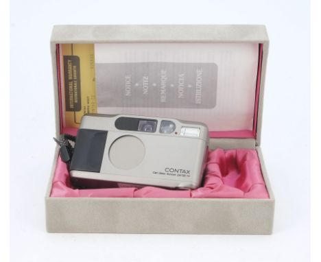 A Contax T2 Compact Camera, serial no. 026598, Titanium, shutter tested, body VG, with Carl Zeiss Sonnar 38mm f/2.8 lens, ele