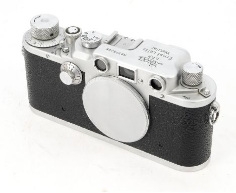 A Leica IIIc Camera Body, serial no. 379286, 1941/42, chrome, shutter intermittently sticking at slower speeds, body, VG, wit