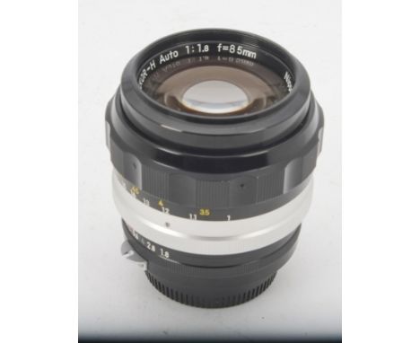 A Nikon Nikkor-H Auto 85mm f/1.8 Lens, serial no. 195148, AI, black, barrel, VG, elements, G-VG, with maker's caps