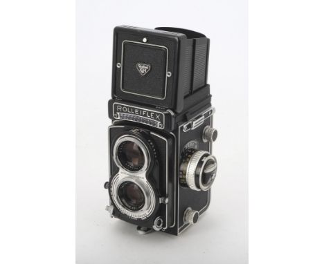 A Rolleiflex T TLR Camera, serial no. 2193050, type 1, shutter working, meter responding, body, G-VG, Rollei red ribbon attac