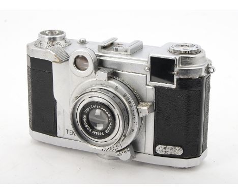 A Zeiss Ikon Tenax II Camera, serial no. H76263, chrome, body, G, marks to chrome around lugs, shutter working, with a Carl Z
