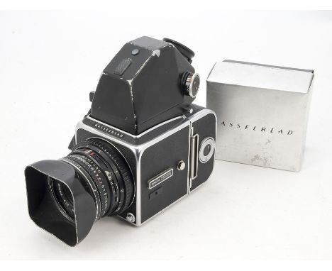 A Hassleblad 500C/M Camera, serial no. RV1251884, 1981, chrome, shutter working, body, G, with A12 film back, no. RH3224671, 