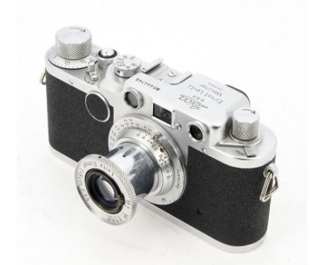 A Leica IIc Sharkskin Camera, serial no. 444745, 1949, chrome, shutter working, body, G-VG, light marks to chrome, with 5cm f