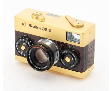 A Rollei 35S 'Gold' Viewfinder Camera, serial no. 001040, 24 Karat gold plated and African lizard skin leatherette, 60th Anni