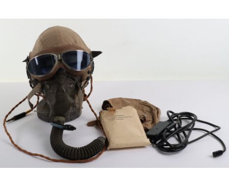 WW2 US Army Air Force Flying Helmet and Oxygen Mask: Tan flying helmet with earpieces and lead, makers label inside with gogg