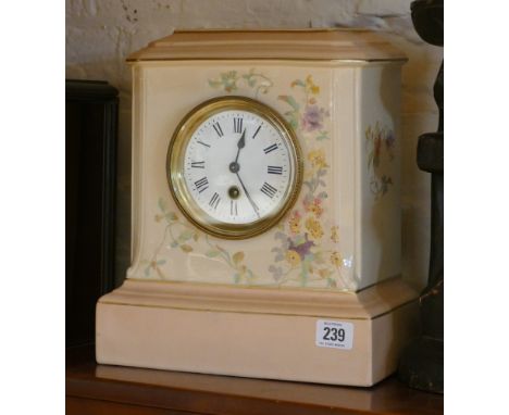 Mantle clock in floral decorated and pale pink china case, standing approx 11" high 