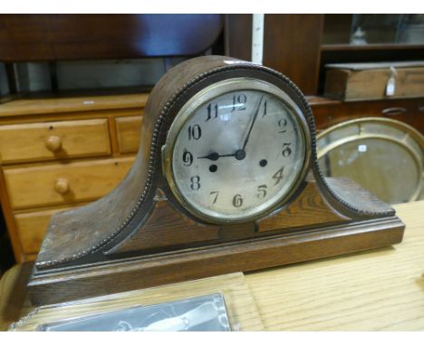 Striking mantel clock in Napoleon style case 