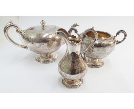 3 piece Victorian Scottish silver tea service of compressed melon shape with floral engraving, Edinburgh hallmarks 1852 - 185